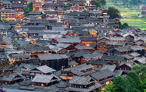 雅安6种常见的外墙仿石漆施工工艺！